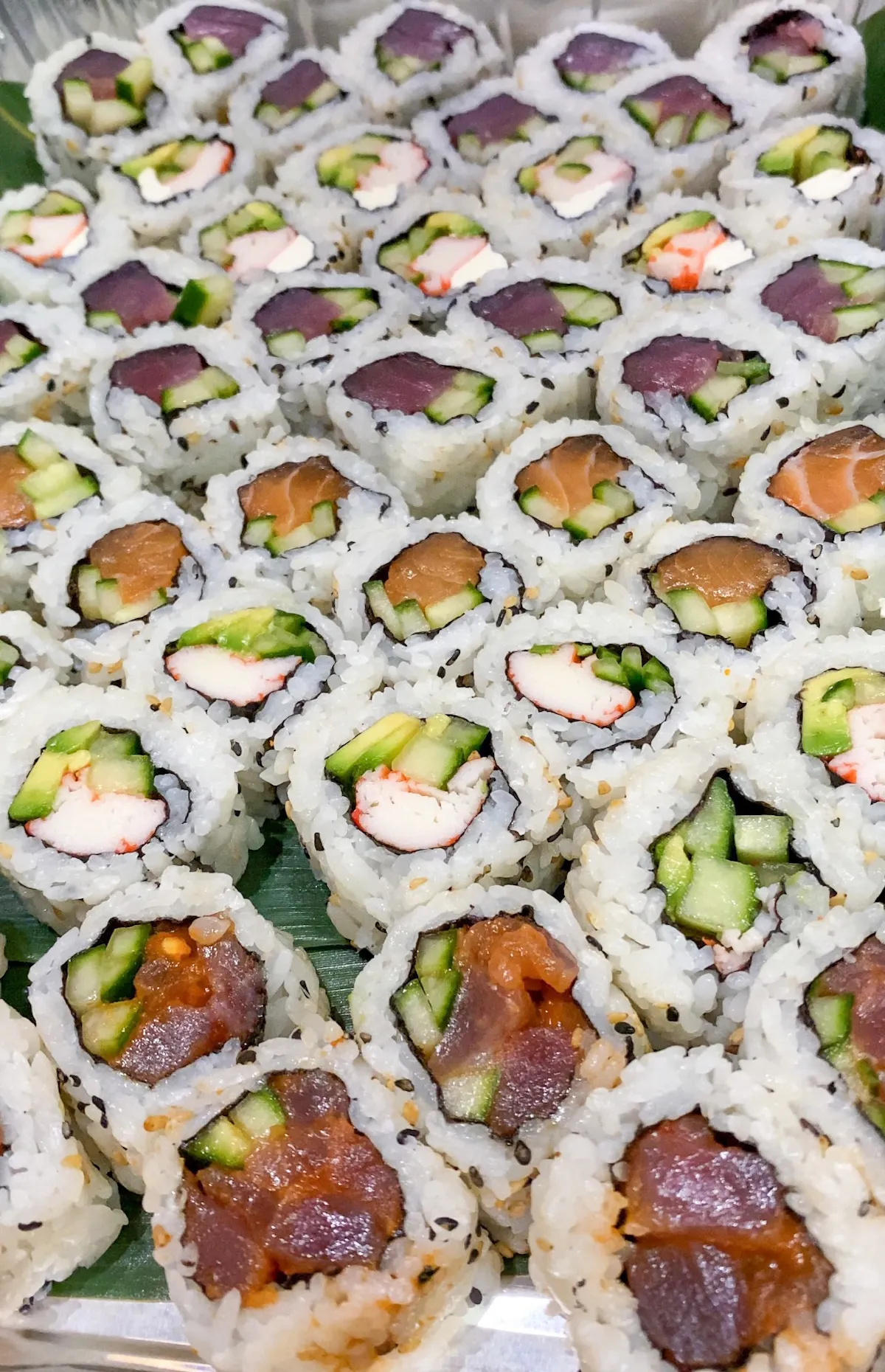 a dish is filled with sushi